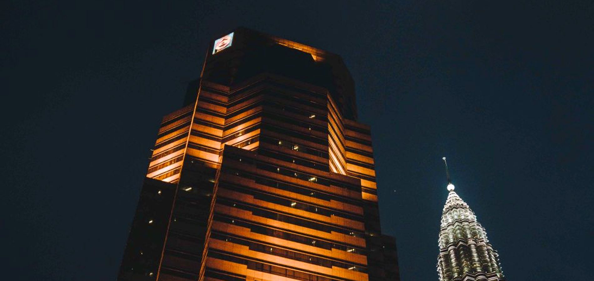 Kuala Lumpur towers lit at night